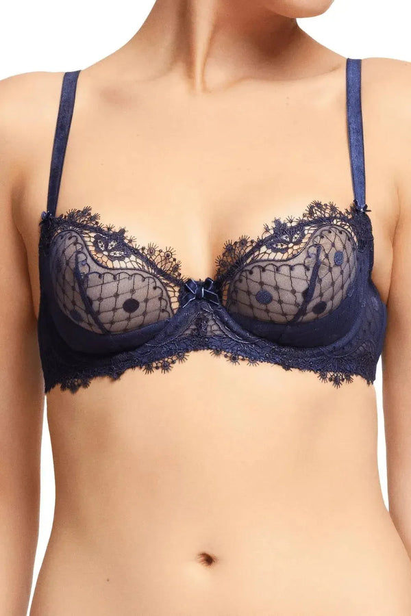 Dita Von Teese Vedette Underwire Bra in navy, featuring sheer polka dot tulle, eyelash lace, and velvet details.