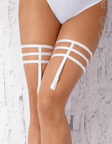 Seductive white Virason garters with delicate multi-strap design, enhancing any lingerie set.